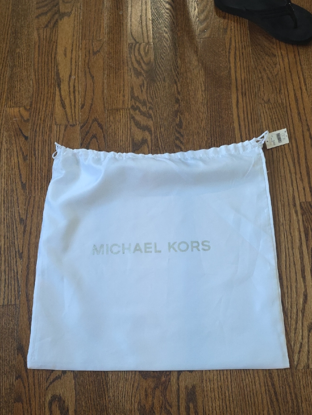 Michael Kors White & Silver Logo Drawstring Bag